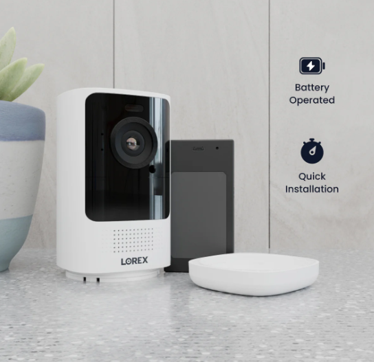 Lorex 4K wireless spotlight camera with detachable battery pack and base station, highlighting its quick installation and battery-operated design.