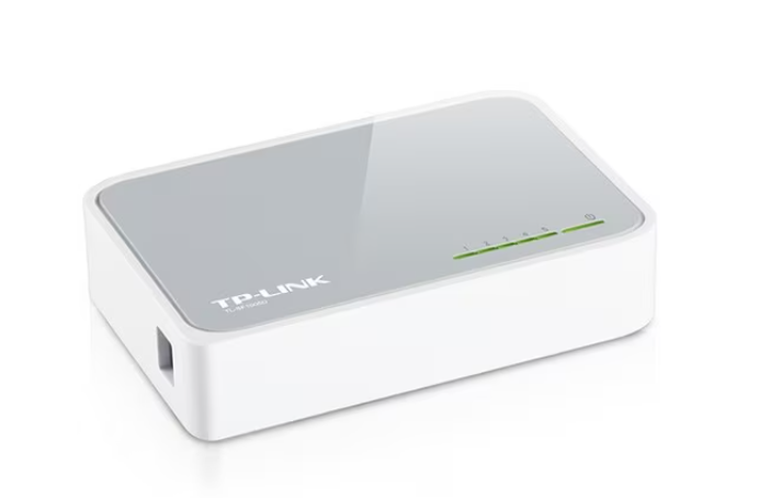 Angled view of the TP-Link Ethernet switch TL-SF1005D, showcasing its compact, fanless design with LED indicators and sleek white casing.