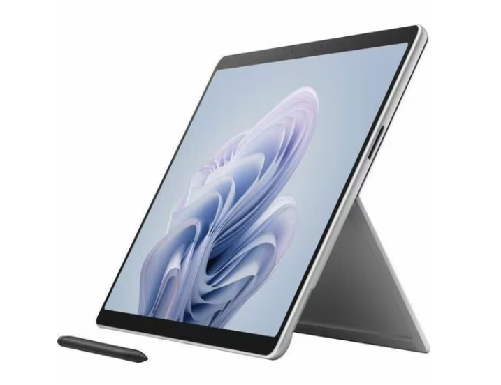 Side view of a 10 Windows tablet (Microsoft Surface Pro 10) with kickstand extended and stylus resting in front, displaying a vibrant screen.